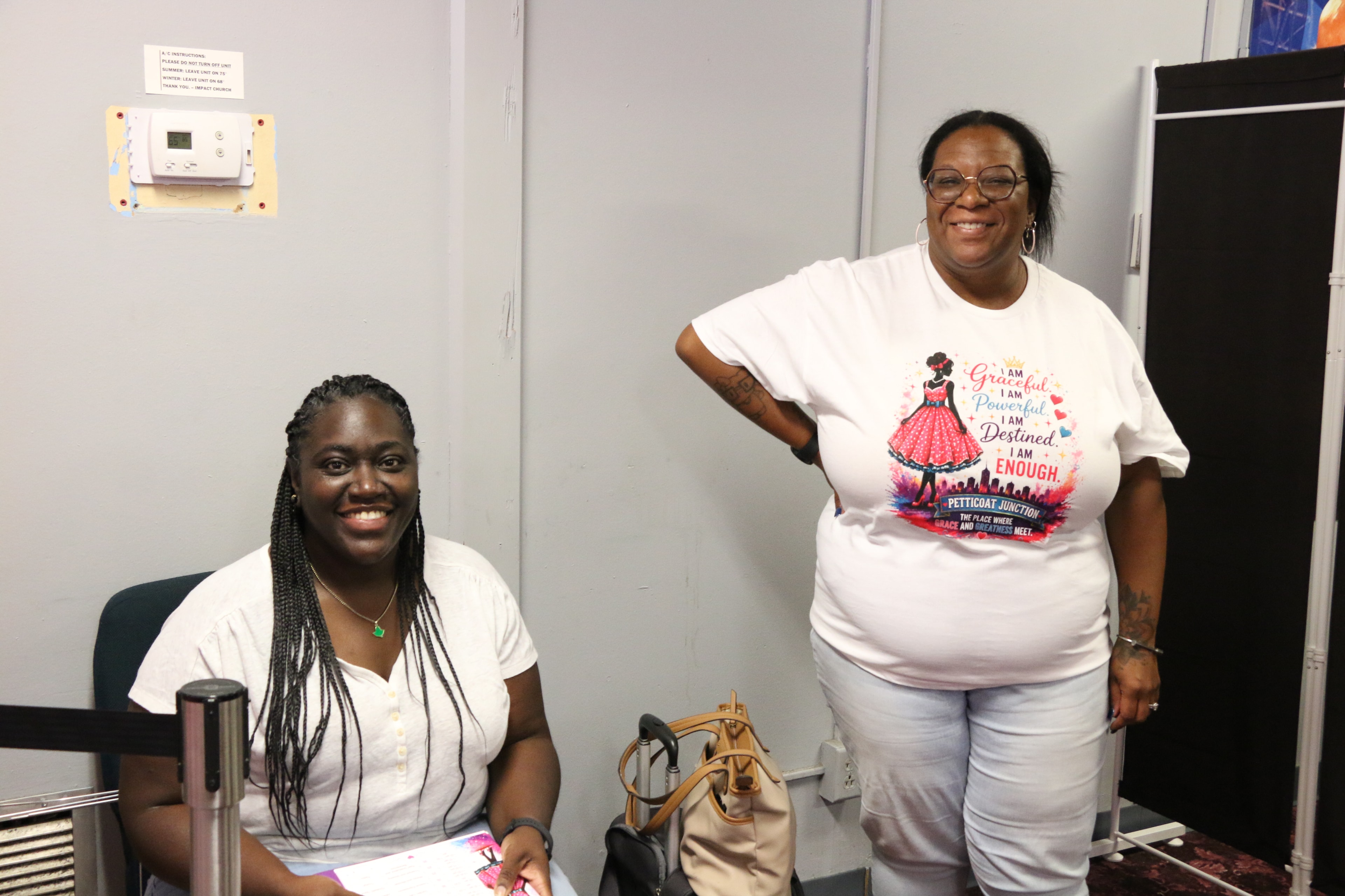Two attendees smiling at the Petticoat Junction Day Camp
